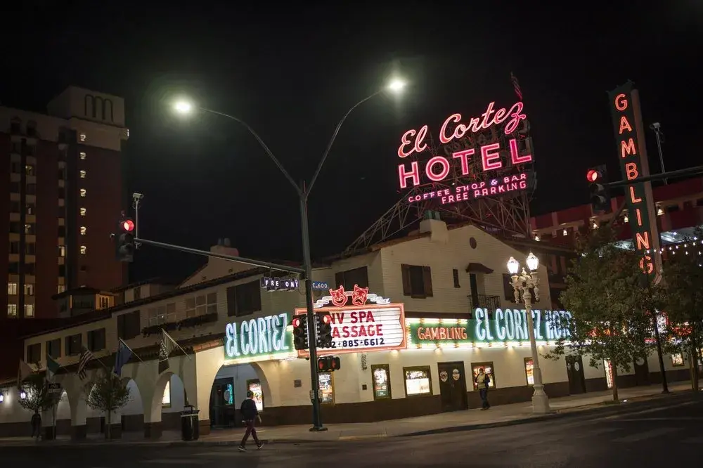 Two men walk past the El Cortez hotel-casino in downtown Las Vegas, Wednesday, Nov. 11, 2020. Image by Wong Maye-E / AP Photo. United States, 2020.