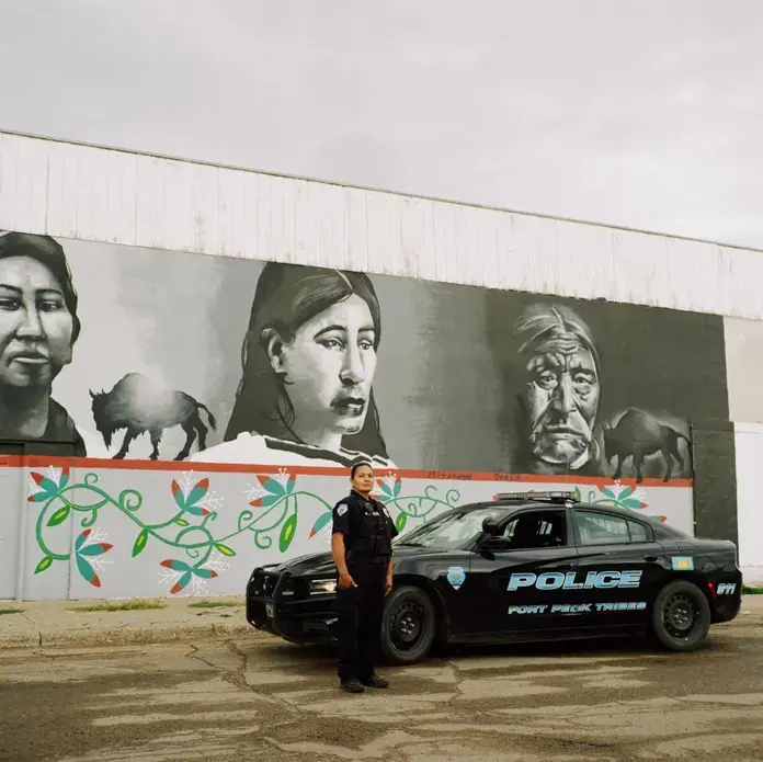 Coretta Greybear the Fort Peck tribal police. Image by Sara Hylton. United States, 2019.