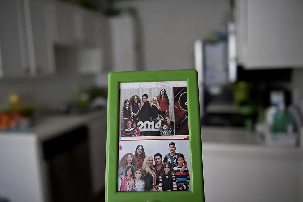 Photos of the Flores family from the past are seen in their Chula Vista kitchen. Image by Amanda Cowan. United States, 2019. Photos of the Flores family from the past are seen in their Chula Vista kitchen. Image by Amanda Cowan. United States, 2019.