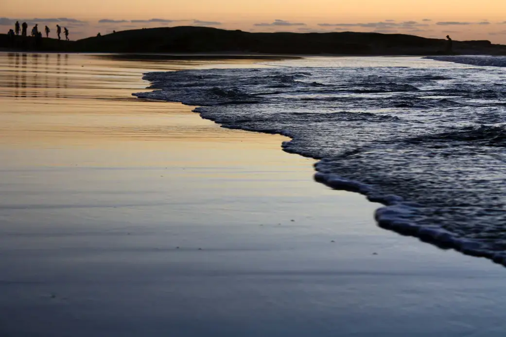 The tide rolls in on the shores of Cape Town, South Africa. Prospecting rights for offshore mining cover 10 percent of the country's exclusive marine economic zone. Image by Mark Olalde. South Africa, 2016. The tide rolls in on the shores of Cape Town, South Africa. Prospecting rights for offshore mining cover 10 percent of the country's exclusive marine economic zone. Image by Mark Olalde. South Africa, 2016.