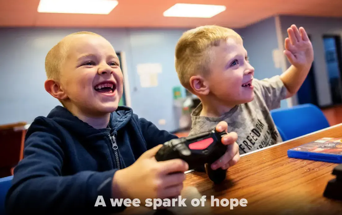 Kyle Hamilton, 7, left, and Lucas Barpon, 7, both of Possilpark, play a wrestling video game on a Playstation during a Young People's Futures session, Oct. 25, 2019, at Possilpoint Community Centre in Possilpark, Glasgow, Scotland. Image by Michael Santiago. United Kingdom, 2019. Kyle Hamilton, 7, left, and Lucas Barpon, 7, both of Possilpark, play a wrestling video game on a Playstation during a Young People's Futures session, Oct. 25, 2019, at Possilpoint Community Centre in Possilpark, Glasgow, Scotland. Image by Michael Santiago. United Kingdom, 2019.
