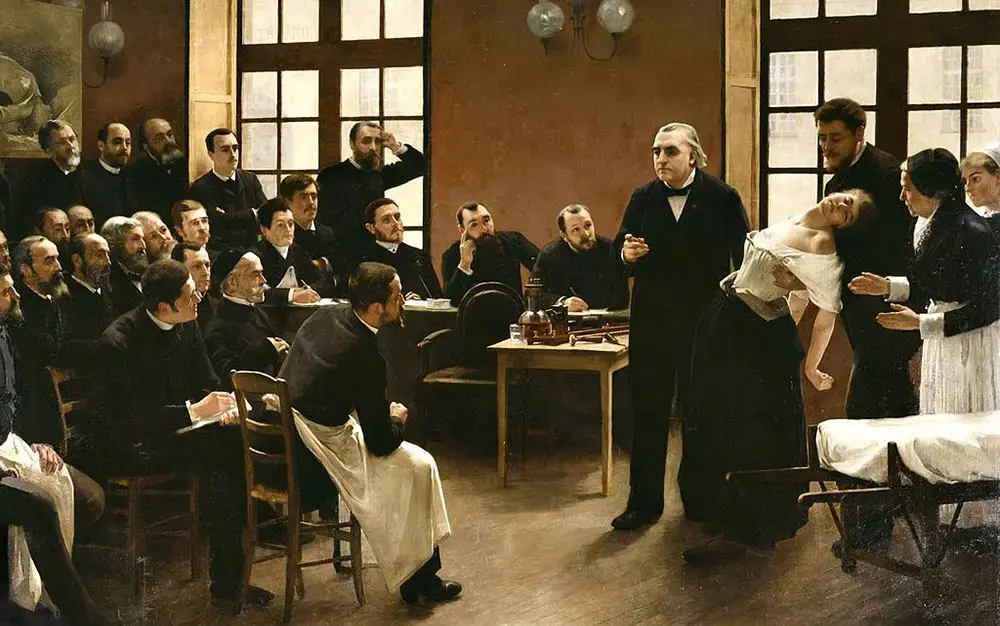 A Clinical Lesson at the Salpêtrière by Pierre Aristide André Brouillet (1857-1914) featuring Dr Charcot. Image courtesy Wiki Commons. A Clinical Lesson at the Salpêtrière by Pierre Aristide André Brouillet (1857-1914) featuring Dr Charcot. Image courtesy Wiki Commons.