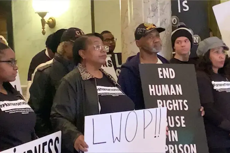 Miss. Sen. John Horne says “we continue to devalue Black lives” with the overwhelming amount of cruel and unusual sentencing happening in Mississippi prisons. Here, concerned citizens unite and protest to bring awareness to those sentenced unfairly to life without parole. Image courtesy of Asia Allen/MCIR.