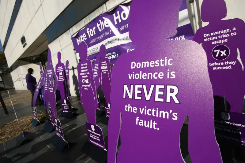 A display from a Nov. 17 Silent Witness Memorial at the Family Safety Center in Memphis, remembering victims of domestic violence. Image by Karen Pulfer Focht. United States, 2020. A display from a Nov. 17 Silent Witness Memorial at the Family Safety Center in Memphis, remembering victims of domestic violence. Image by Karen Pulfer Focht. United States, 2020.