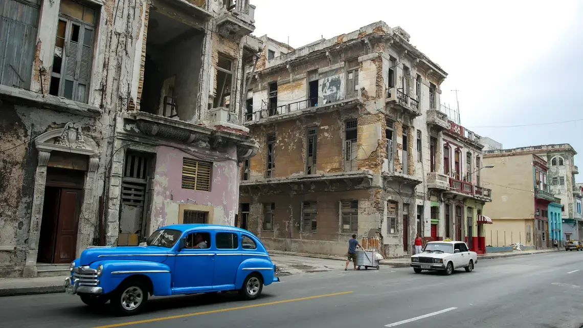 Buildings a block from Havana’s famed Malecón, a seaside walkway stretching more than four miles, show the ravages of time and weather. Image by Tracey Eaton. Cuba, 2018. Buildings a block from Havana’s famed Malecón, a seaside walkway stretching more than four miles, show the ravages of time and weather. Image by Tracey Eaton. Cuba, 2018.