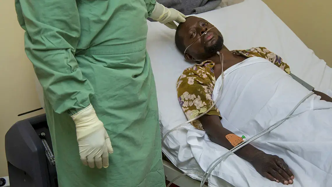 A COVID-19 patient in the Democratic Republic of the Congo. Image by Kenny Mbala/DNDi. The Congo, 2020. A COVID-19 patient in the Democratic Republic of the Congo. Image by Kenny Mbala/DNDi. The Congo, 2020.