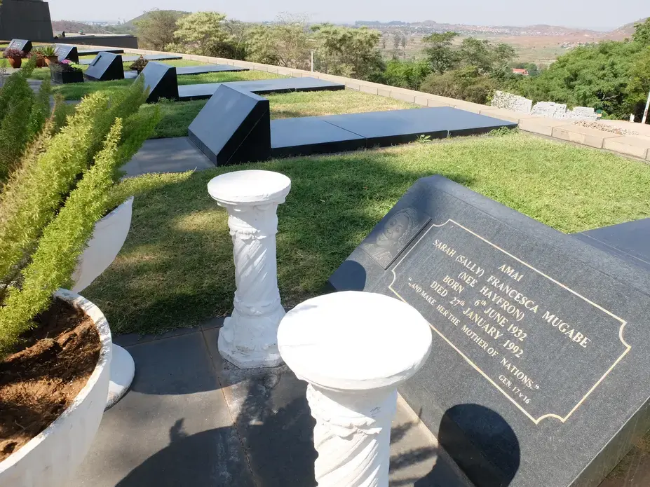 This is the grave of Sally Mugabe, Robert Mugabe's first wife, in Heroes Acre on the edge of Harare. Intriguingly there are two empty graves right next to it. The first will presumably be occupied by Mugabe himself when he dies. But who will claim the second? Image by Martin Fletcher. Zimbabwe, 2016.