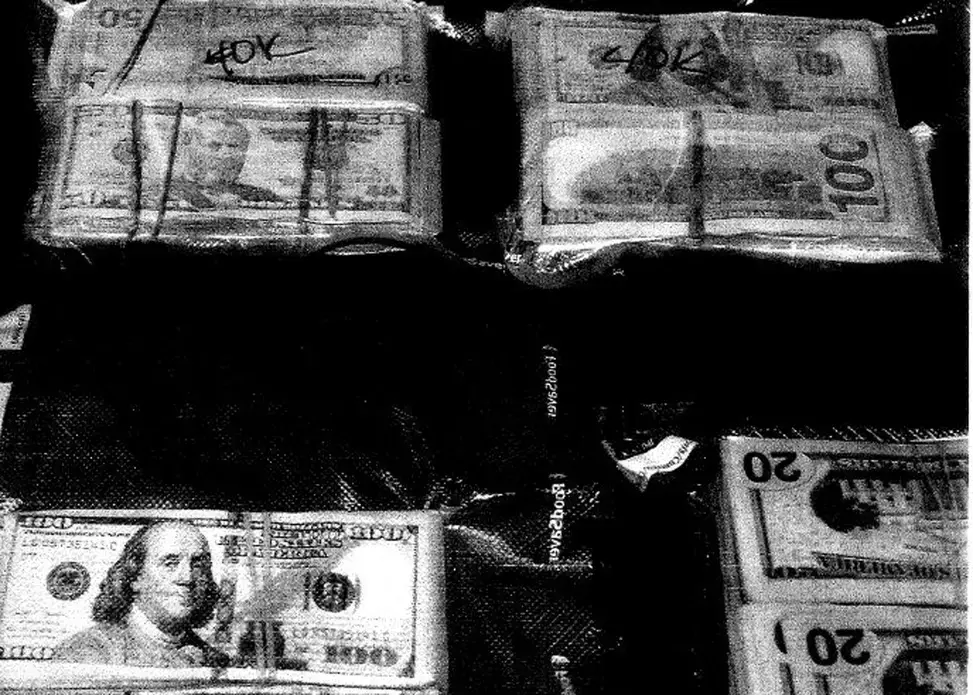 Money seized from a St. Matthews, KY hotel in February 2018 through asset forfeiture. Image courtesy of Jefferson County Circuit Court. United States, 2018.