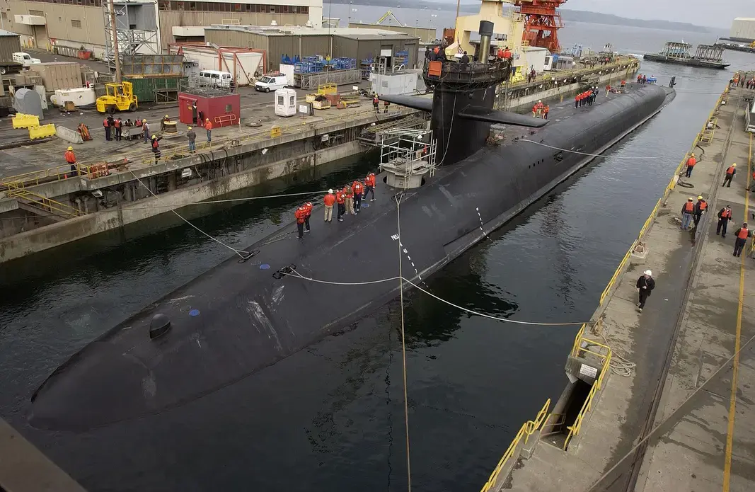 The USS Michigan, a Trident class nuclear submarine, in for repairs at the naval yards in Washington. Image by U.S. Navy. USA, 2002. The USS Michigan, a Trident class nuclear submarine, in for repairs at the naval yards in Washington. Image by U.S. Navy. USA, 2002.