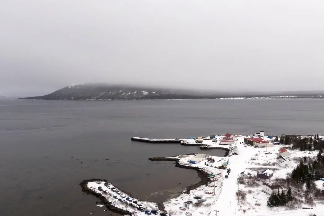 The town of Rigolet reaches out into the waters of Lake Melville on the coast of Labrador on November 14, 2019. Image by Michael G. Seamans. Canada, 2019. The town of Rigolet reaches out into the waters of Lake Melville on the coast of Labrador on November 14, 2019. Image by Michael G. Seamans. Canada, 2019.