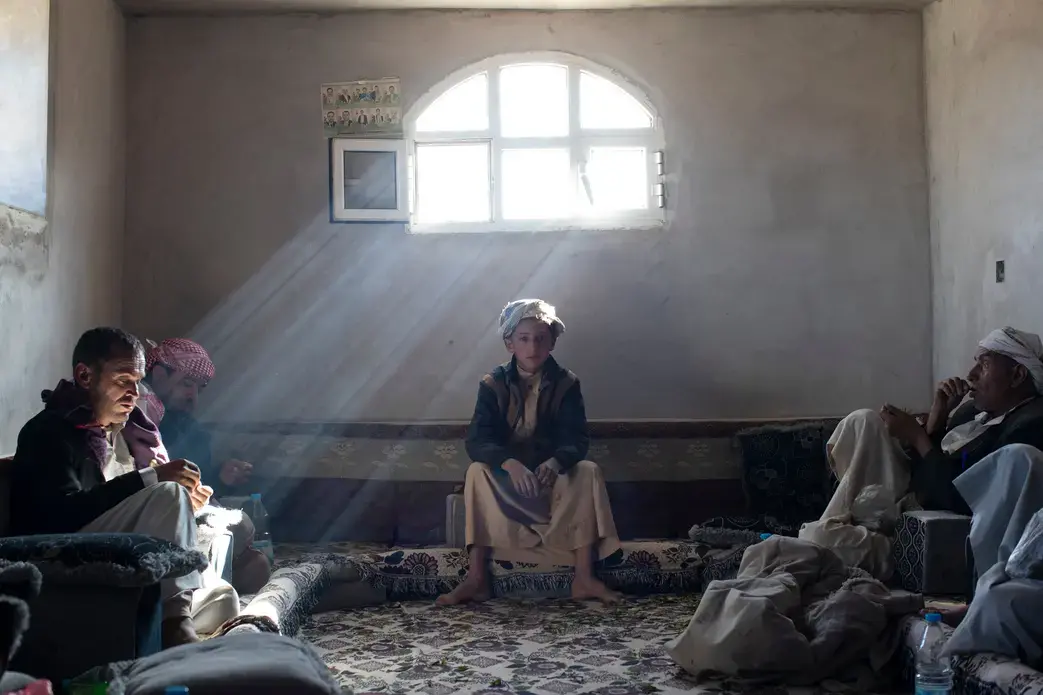 Abdullah Abed al-Abdeli, age 12, whose father died in an airstrike in Northern Yemen. Image by Tyler Hicks/The New York Times. Yemen, 2018.