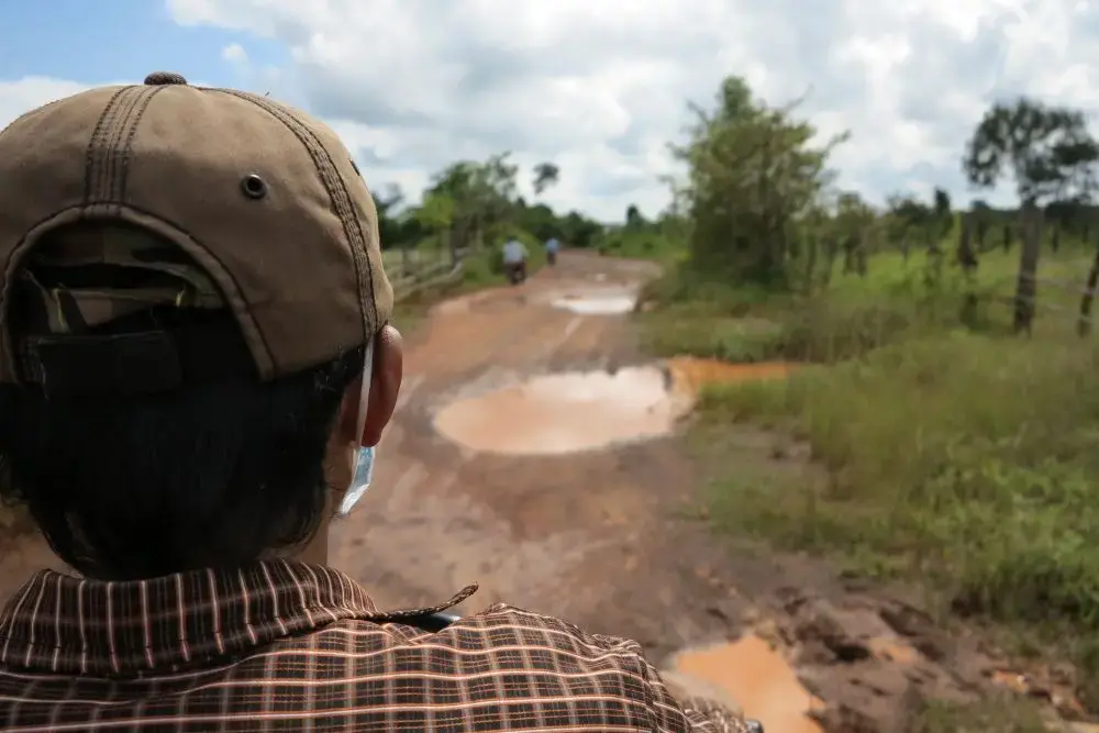 To get back to where Try was killed, Saul Elbein rode on the back of a motorbike, on an appallingly bad road. Image by Saul Elbein. Cambodia, 2014. Image by Saul Elbein. Cambodia, 2014.
