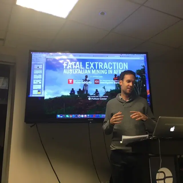 Grantee Will Fitzgibbon describes how he reported "Fatal Extraction: Australian Mining in Africa" at a professional development seminar on December 8, 2016, for DC educators. The seminar, co-facilitated by the Pulitzer Center education department, explored techniques for using art to process global issues. Image by Fareed Mostoufi. Washington, DC, 2016. Media file: will_fitzgibbon.jpg