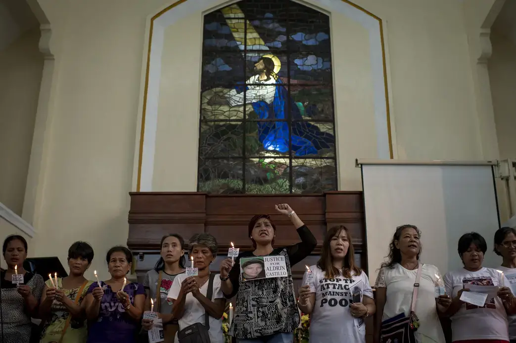 Nanette Castillo (center) and other mothers of drug war victims protest the war on drugs at a solidarity event organized by the ecumenical activist group Rise Up in October. Image by Eloisa Lopez. Philippines, 2018. Nanette Castillo (center) and other mothers of drug war victims protest the war on drugs at a solidarity event organized by the ecumenical activist group Rise Up in October. Image by Eloisa Lopez. Philippines, 2018.