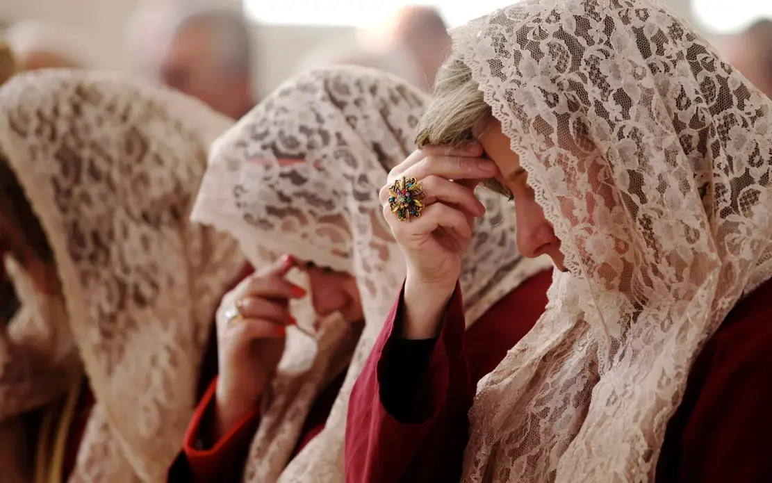 As they did last year, Syrian and Iraqi Christian families in Jordan are praying for peace in their home countries. Image courtesy of Mohammad Hannon/AP. Jordan, 2014. Media file: xtians.jpg