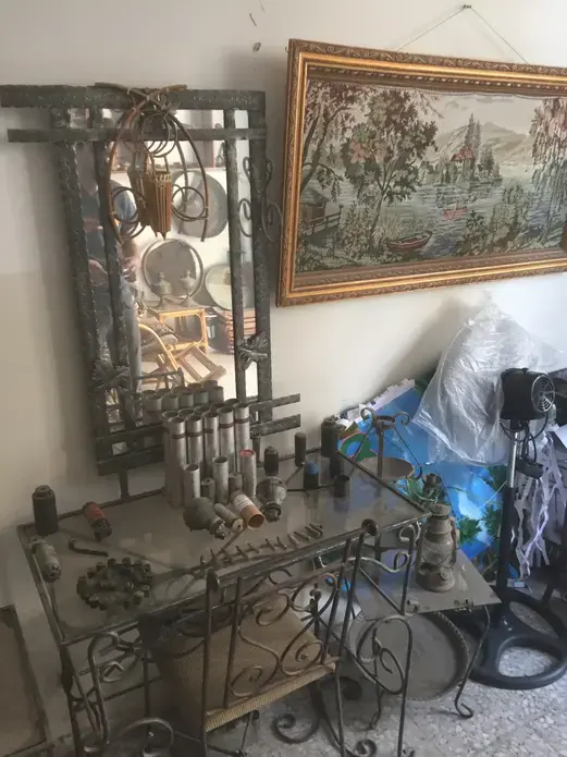 One of Haddad's tables in his office were he stores all the exotic weaponry tested in the Palestinian "Lab" of the West Bank. Image by Matt Kennard. Palestine, 2016. One of Haddad's tables in his office were he stores all the exotic weaponry tested in the Palestinian "Lab" of the West Bank. Image by Matt Kennard. Palestine, 2016.
