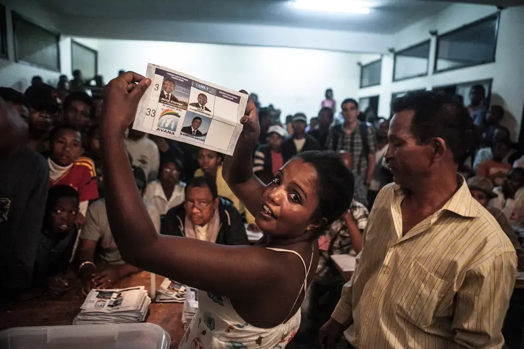 Electoral agents count votes at a polling station in Antananarivo, Madagascar on December 20, 2013 after the second round of presidential election. Image by RIJASOLO / RIVA PRESS. Madagascar, 2013. Media file: electionballot.jpg