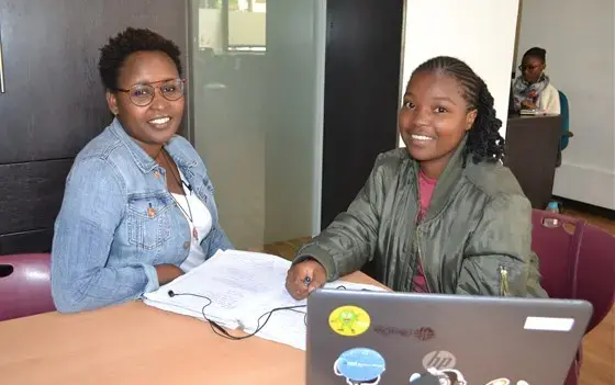 Marie Githinji, Director and Co-Founder at Akirachix, and Marline Khavene, an Akirachix student in Nairobi, Kenya. Image by Janelle Richards. Kenya, 2017. Marie Githinji, Director and Co-Founder at Akirachix, and Marline Khavene, an Akirachix student in Nairobi, Kenya. Image by Janelle Richards. Kenya, 2017.