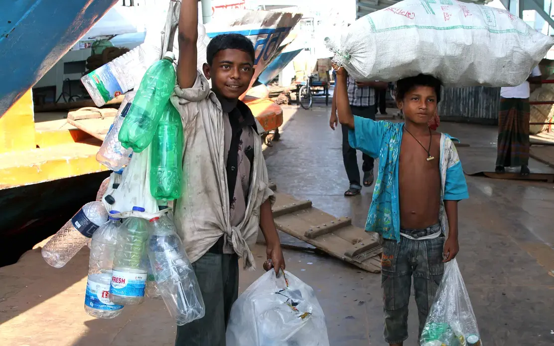 In Dhaka, Bangladesh, some 4 million squatters who live in slums do not have legal access to basic services, such as safe water and toilets. These people often are forced to rely on unsafe well water provided by slum lords or buy bottled water from “water sharks.” Media file: 20100901_0996_2.jpg