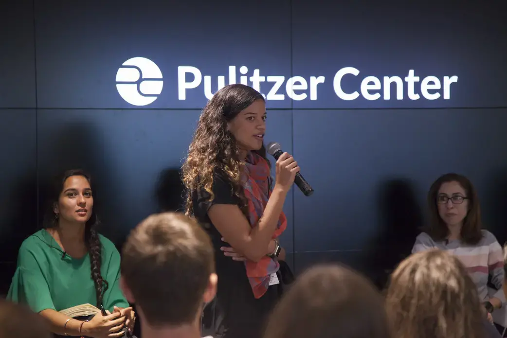 Hana Carey, Pulitzer Center Campus Consortium Coordinator, introducing the 'On Covering Sensitive Issues and Coping with Trauma' panelists who shared their projects and the challenges they faced reporting on sensitive issues. Image Jin Ding. United States, 2018.