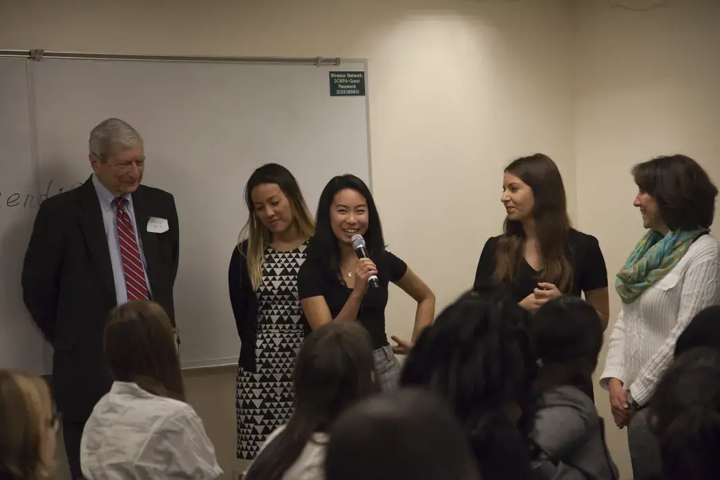 Pulitzer Center intern Ashley Zhang introduces herself to student fellows. Behind her are Pulitzer Center staff Marvin Kalb, Julia Kelmers, Hannah Berk, and Ann Peters. Image by Jin Ding. United States, 2018.