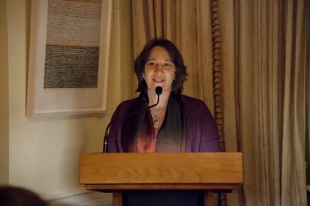 Pulitzer Center University and Community Outreach Director Ann Peters delivers closing remarks at the Cosmos Club. Image by Jin Ding. United States, 2018.