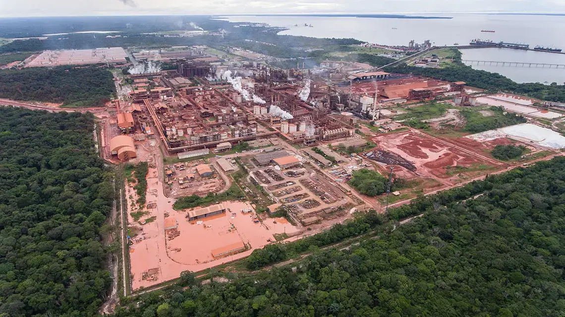 An aerial view of damage caused by a tailings dam leak at Norse Hydro's industrial complex in Barcarena in the Brazilian Amazon in 2018. The leak, caused by heavy rains, engulfed nearby communities in a flash flood that contaminated the Murucupí River. Image by Cícero Pedrosa Neto. Brazil, 2018.