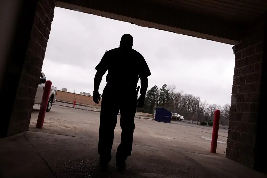 A silhouette shows a man named James, who says the program Achieving Change Through Value-Based Behavior helped him understand how anger and insecurity can lead to domestic violence.