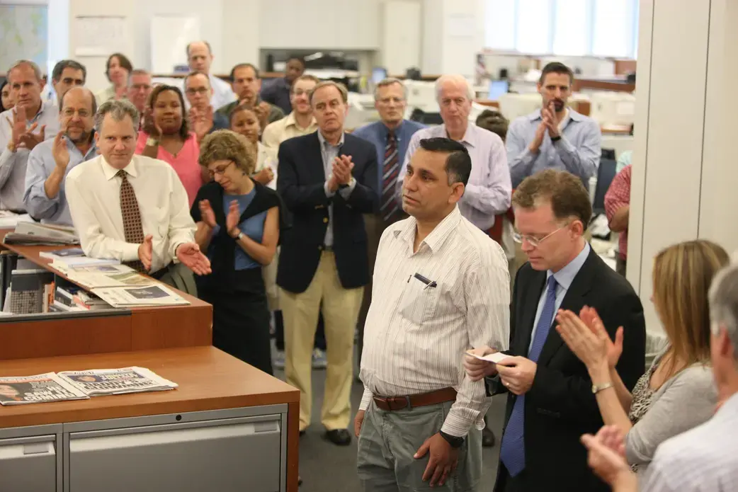 Tahir Luddin and David Rohde at the office of the New York Times, for which Rohde reported, after escaping the Taliban.Photograph by James Estrin / NYT / Redux