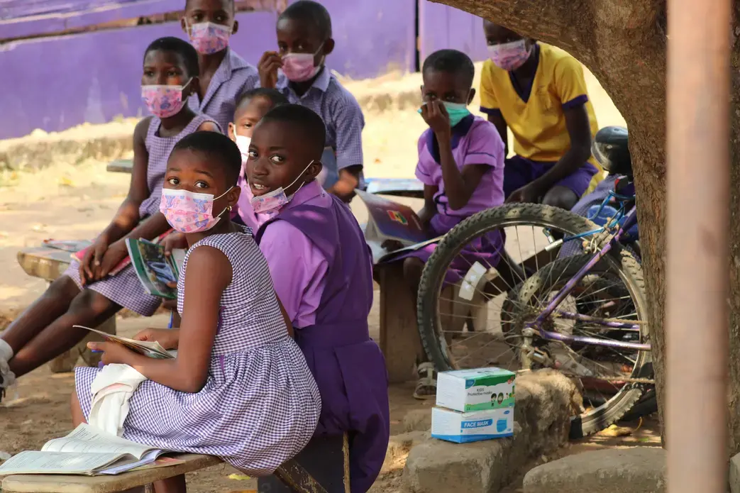 LIVING16_PHENGSITTHY.JPG children at primary school in Ghana wearing masks
