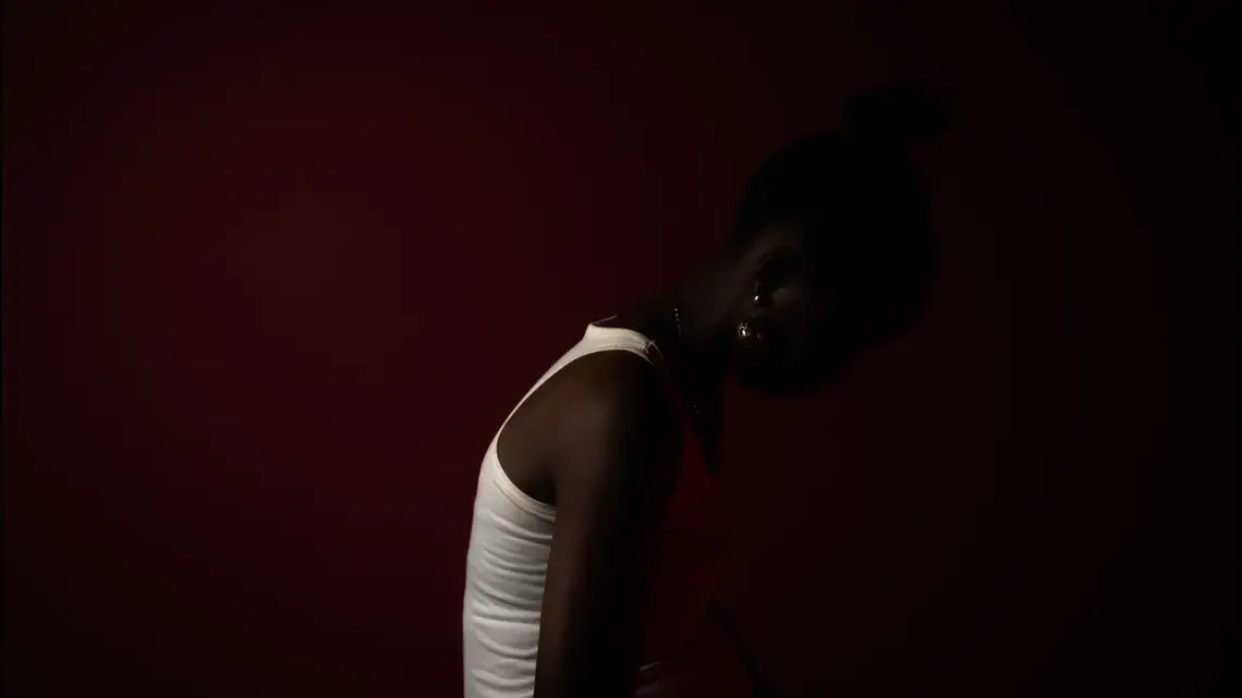 2.jpg person shrouded in shadows