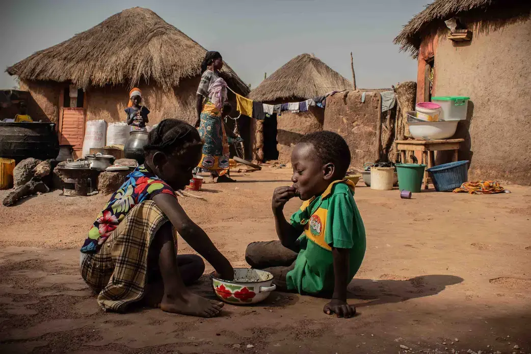 Children in Alimatu Alidu’s household, shown here, enjoy a dish made from cowpea. Image by Ankur Paliwal. Ghana, 2019. Children in Alimatu Alidu’s household, shown here, enjoy a dish made from cowpea. Image by Ankur Paliwal. Ghana, 2019.