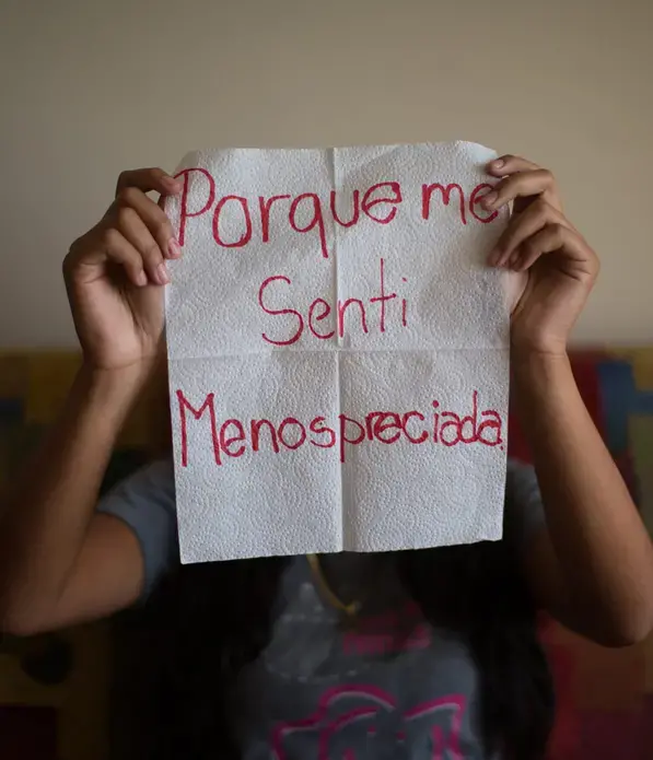 Carmen, 16.</p>
<p>The napkin reads: 'because I felt disparaged.' When she think about her childhood, she remembers abuse and spending days alone, in hiding. Her dad was a drug addict who beat her mother. One day at school someone told her that hurting herself would no longer cause pain. 'I did not feel anything. I learned that hurting myself did not solve anything, that I should seek help from someone who could give me good advice,' she recalls. And she did.</p>
<p>Image by Almudena Toral. El Salvador, 2018.