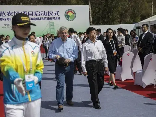 Ambassador Terry Branstad and Hebei Party Secretary, Zhao Kezhi walk together through the groundbreaking ceremony for the China-US Demonstration Farm on Saturday, Sept. 23, 2017, in Luanping County, Hebei. Image by Kelsey Kremer. 
