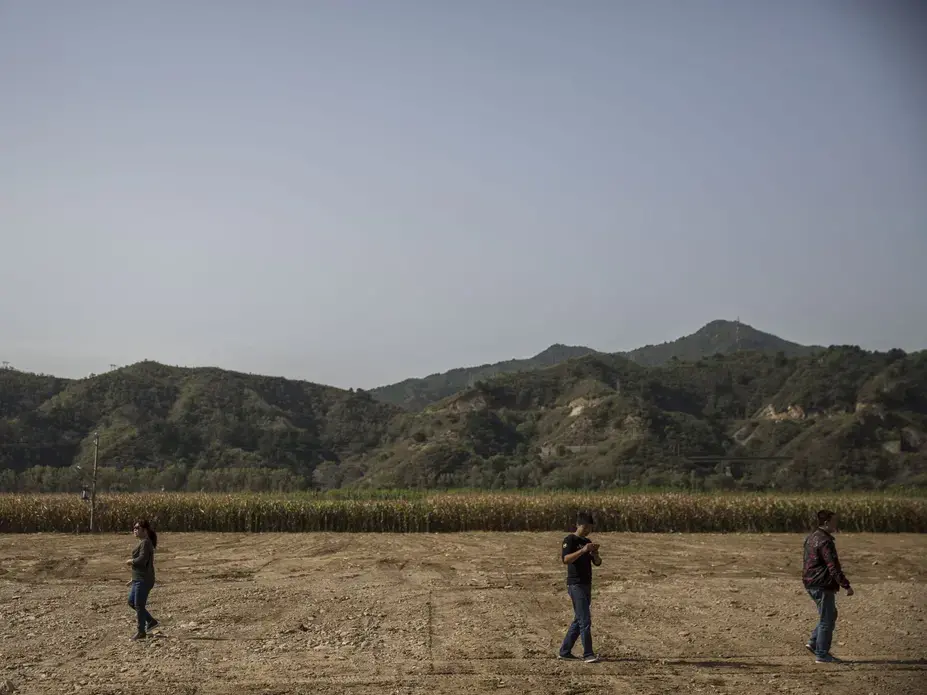 In the mountains of Luanping County, land has been cleared for the groundbreaking of the China-US Demonstration Farm on Saturday, Sept. 23, 2017, in Hebei, China. Image by Kelsey Kremer.