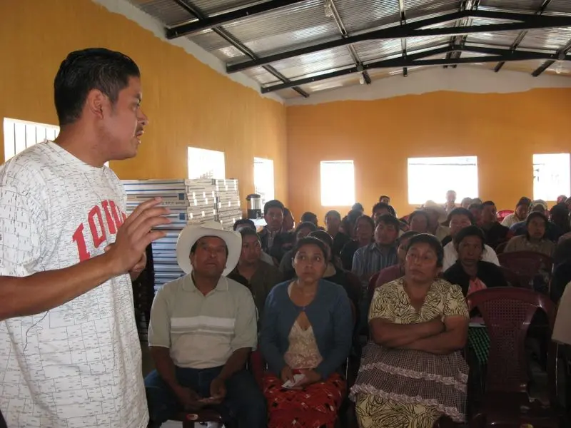 A meeting of workers deported by the U.S. government after the Postville, Iowa kosher meat-packing plant raid. Image by Samuel Loewenberg. Guatemala, 2009. Media file: 6a00d834520a2e69e201156f8f1348970b-800wi.jpg