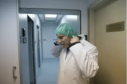 David Sher, CEO of Elite-IVF gets ready to enter a sterile lab in Cyprus.