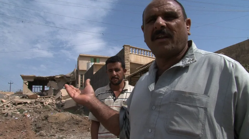 Arab residents of a neighborhood in Mosul, Iraq.