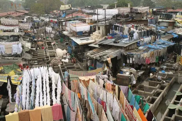 In Dhobi Ghat, in the heart of Mumbai, workers process tens of thousands of pieces of laundry a day, mostly by hand. Jon Sawyer/Pulitzer Center Laundering a city, by hand: Mumbai's Dhobi Ghat