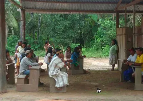 Meeting in Porotobango. Photograph Courtesy of Lone OutPost, Inc. 1