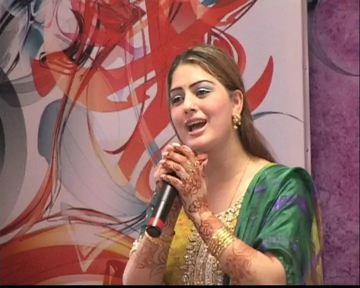 Ghazala Javed, 24-year-old popular Pashto singer. Photo found on Ghazala Javed's Facebook page. Dubai, 2010. Media file: GJ music show.jpg