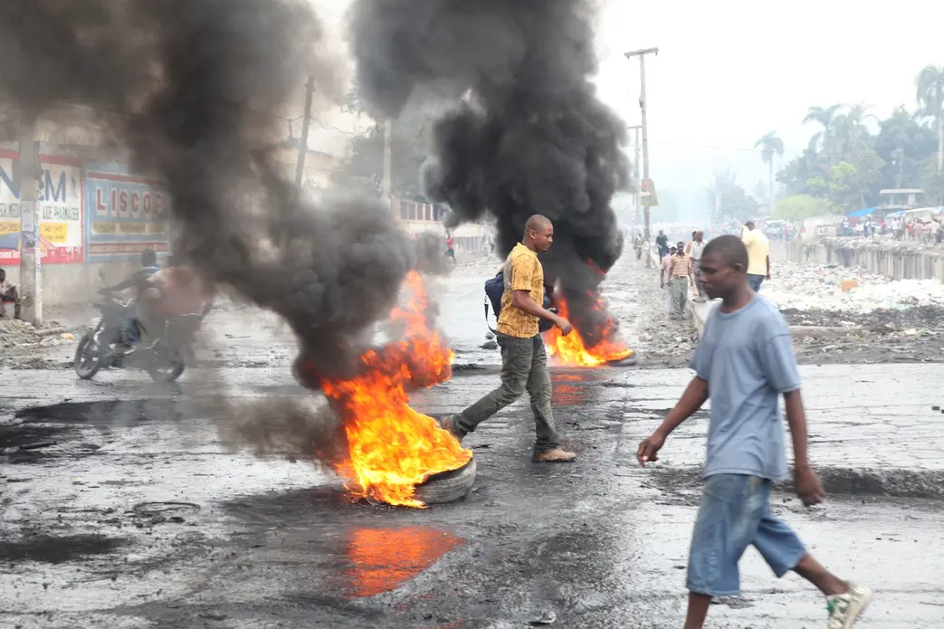 Riots in Carrefour following Haiti's elections. Image by Andre Lambertson. Haiti, 2010. Media file: Haiti_Election_Riots_9229_9376.jpg