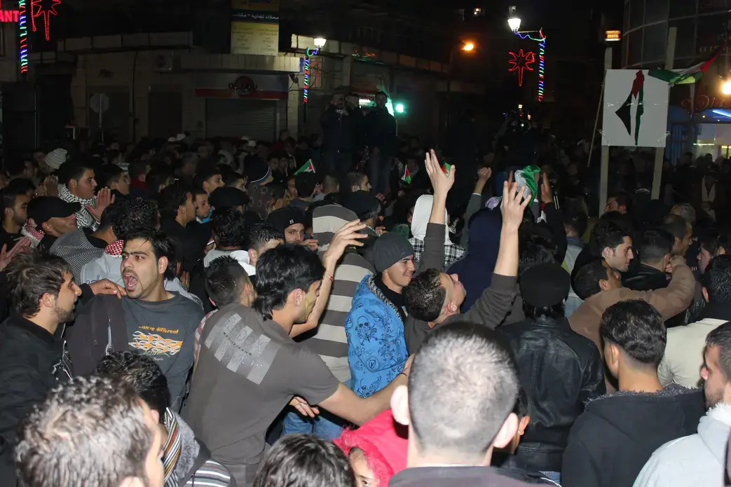 Hundreds of young people gathered in Arafat Square in downtown Ramallah to ring in 2012 with a concert to “Keep the New Year Palestinian.” Image by Anna Van Hollen. Ramallah, 2011. Media file: IMG_0296.JPG