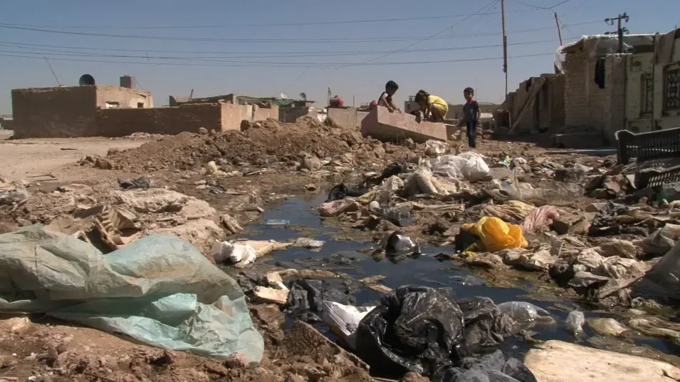 Iraqi refugees in a Baghdad neighborhood. Image by David Enders. Iraq, 2011. Media file: Iraq_Enders.jpg