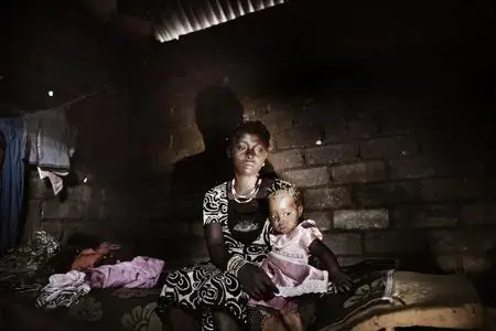 Marleine Solange Yagasaurana was 16 when she was abducted, then raped and impregnated by a commander in the Lord's Resistance Army. Image by Marcus Bleasdale. Central African Republic, 2010. Media file: LRA_Central_African_Republic_IDP.jpg
