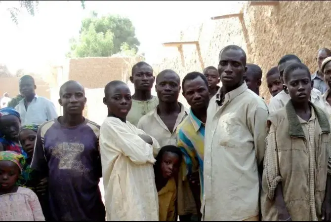 Farmers in the village of 'Yardanko in Nigeria's northern Katsina State after their crops were destroyed by nomadic herders. Image by David Hecht. Nigeria, 2009. Media file: Nigeria_01_05_09_Larazo_Hecht_cattle2.jpg
