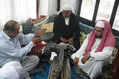 Antiterror film: 'The Lost Bet' is a new government-backed feature film produced by Fadl al-Olfi, left, who is seen directing two actors. Image by Ginny Hill. Yemen, 2008. Media file: OTERRORFILM_P1.jpg_full_600.jpg