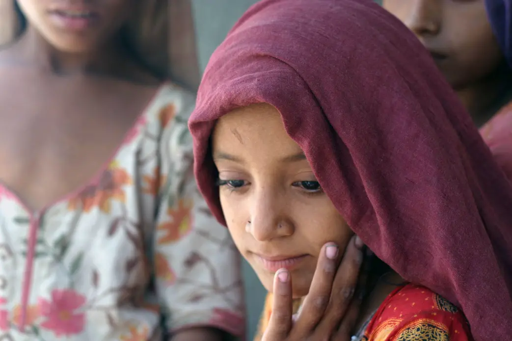 Farida Kharapour, 7 years old, is one of the approximately 500,000
IDPs still living in makeshift tents due to flooding in Sukkur, Pakistan. Image by Deena Guzder. Pakistan, 2010. Media file: Pakistan_Flood_Relief_Sukkur.jpg