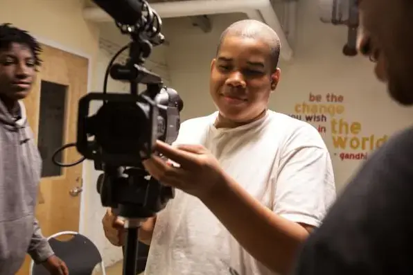 Student adjusts camera in preparation for mock interview. Image by Jake Naughton. Chicago, 2012. Media file: Screen shot 2012-08-14 at 2.35.26 PM.png