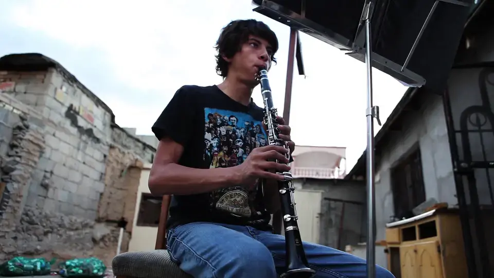 Esteban Ruiseco practices the clarinet. Image by Dominic Bracco. Mexico, 2011. Media file: The_ClarinetistHIRES.jpg